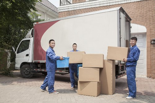 Local movers loading boxes and furniture in east London