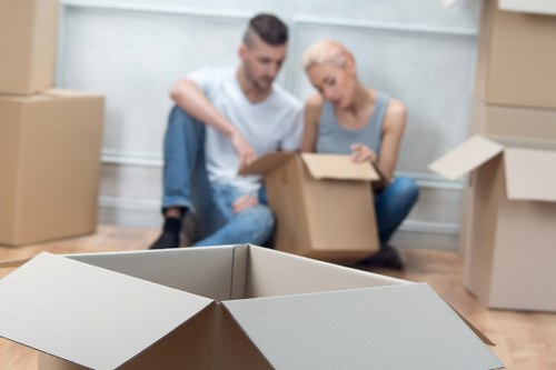 Loading furniture into a moving truck for a Leyton property move