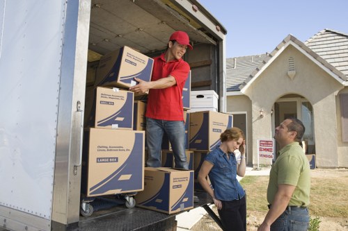 Moving day preparation checklist and packed boxes for a Leyton home removal