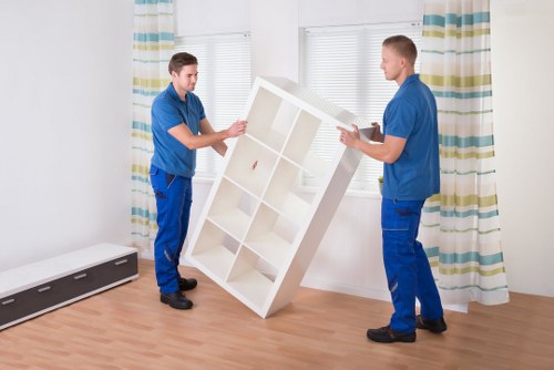 Business furniture and equipment being prepared for an office move